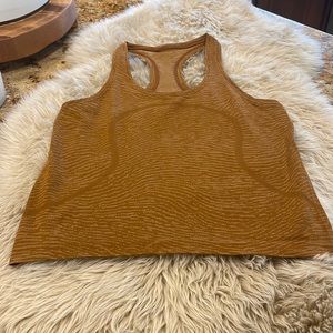 Lululemon Women’s Swiftly Tech Racerback Race length. Size 8 Honey tan color.